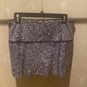 Lululemon tennis skirt with pleats, excellent condition. Size 8 Reg.